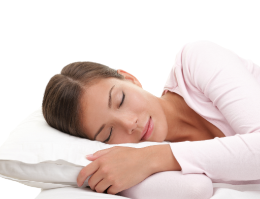 Peaceful woman sleeping on her side with a relaxed expression, highlighting the benefits of restful sleep.