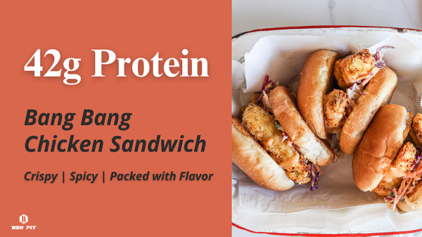 High-protein Bang Bang Chicken Sandwich with crispy chicken, slaw, and spicy sauce in soft buns.