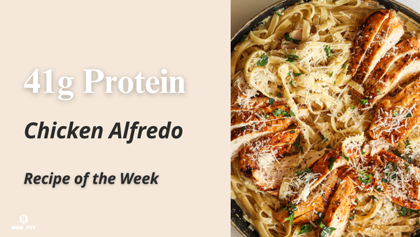 Grilled chicken alfredo with creamy sauce and parsley on a white plate — a high-protein, low-carb recipe for muscle recovery and comfort